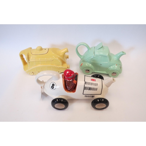 1148 - A Tony Carter race car teapot, Carlton Ware car teapot and another (3)