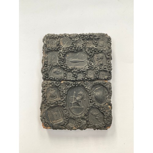 8547 - A 19th Century Gutta Percha card case of rectangular form, impressed with various seals including Ad... 