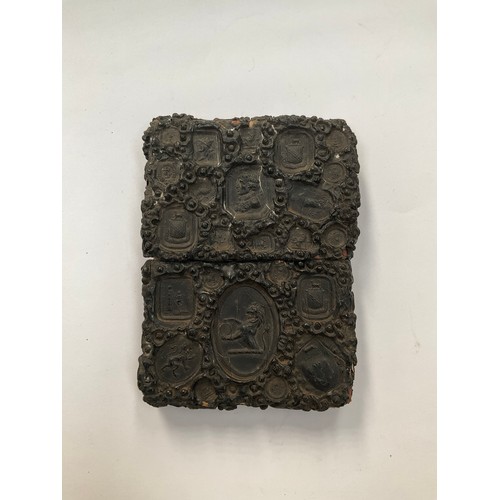 8547 - A 19th Century Gutta Percha card case of rectangular form, impressed with various seals including Ad... 