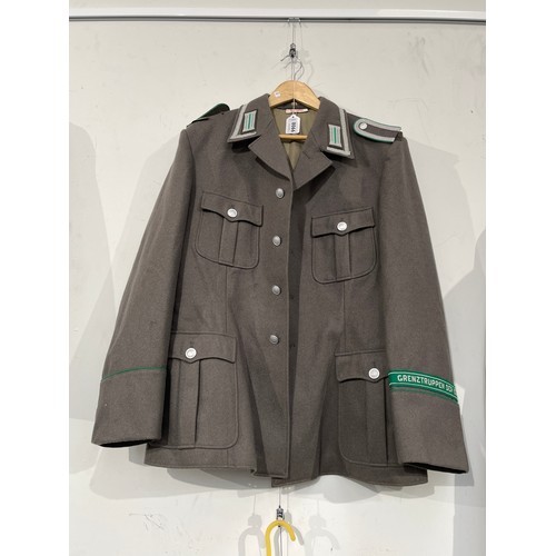 8066 - A West German Army Border Guard's jacket, 'GRENZTRUPPEN DER DDR' green band to sleeve