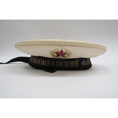 8123 - Four USSR Russian Soviet Navy sailor's hats, three white with black tally, the other black with tall... 