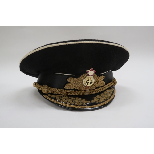 8124 - Two USSR Russian Soviet Naval officer's peaked visor caps, both high-ranking and circa 1950's-60s, e... 