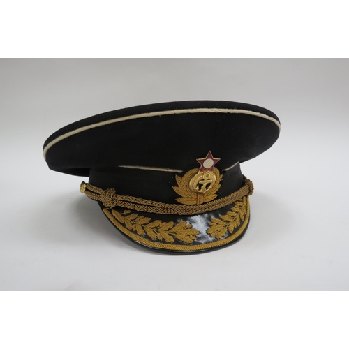 8124 - Two USSR Russian Soviet Naval officer's peaked visor caps, both high-ranking and circa 1950's-60s, e... 