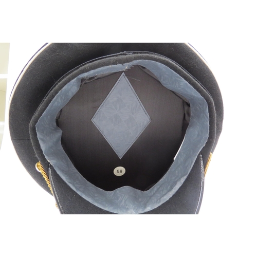 8125 - Three Russian Federation Naval officer's peaked visor caps, two white with black band, the other bla... 