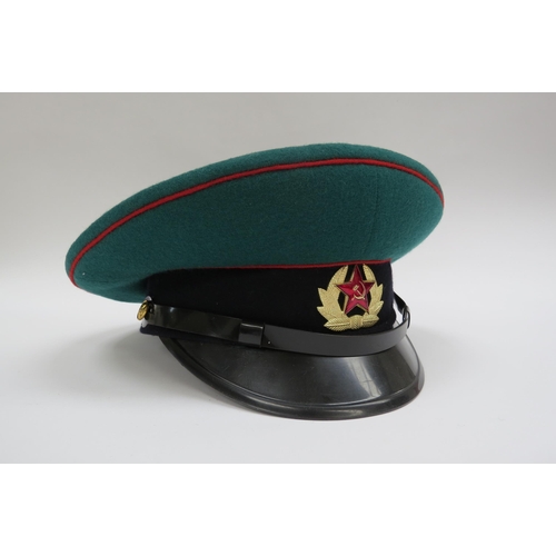 8128 - Four USSR Russian Soviet peaked visor caps: Border Guard (green with red piping), Air Force (blue wi... 