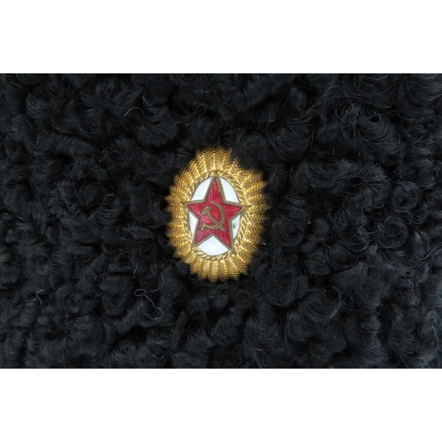 8129 - A USSR Russian Soviet Papakha astrakhan fur hat with black top, gold trim, bearing gilt and red enam... 