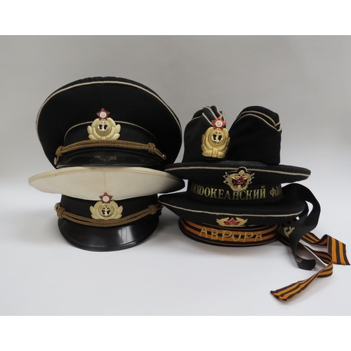 8135 - A quantity of USSR Russian Soviet peaked headwear including two Naval officer’s caps, two sailor’s h... 