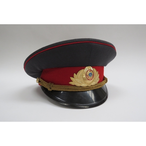 8136 - Four Russian peaked visor caps: Two USSR Soviet era officer's and two Russian Federation (one with r... 