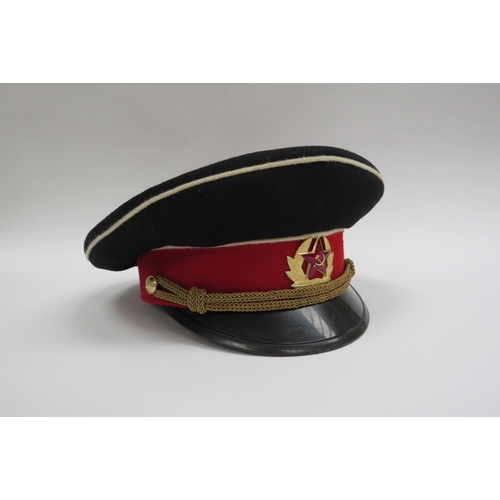 8136 - Four Russian peaked visor caps: Two USSR Soviet era officer's and two Russian Federation (one with r... 