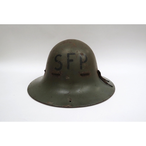 8137 - A WWII British SFP Home Front Helmet with liner and SFP to front (Supplementary Fire Party)