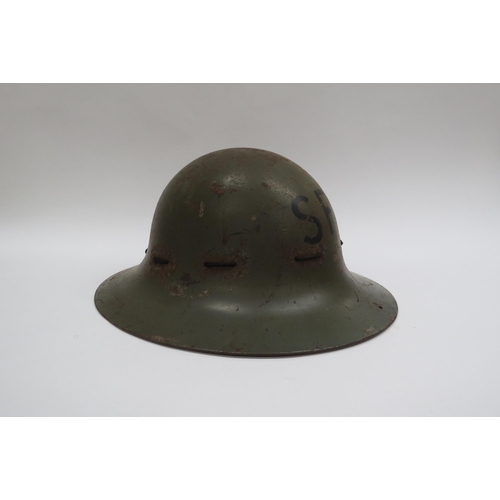 8137 - A WWII British SFP Home Front Helmet with liner and SFP to front (Supplementary Fire Party)