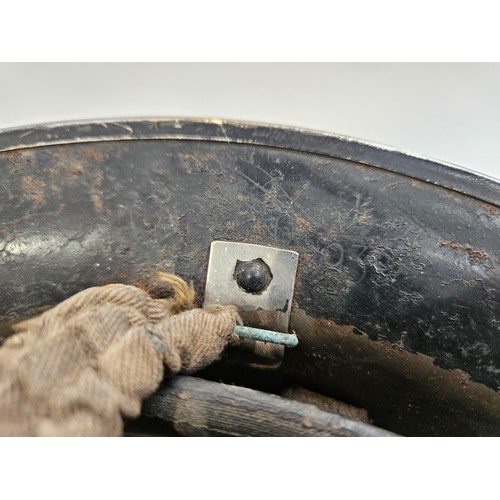 8104 - A WWII British helmet, the shell dated 1939 and liner 1938, with traces of original 'AFS IPSWICH' pa... 