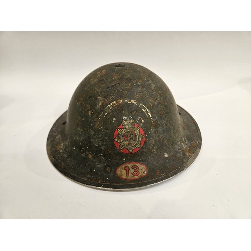 8104 - A WWII British helmet, the shell dated 1939 and liner 1938, with traces of original 'AFS IPSWICH' pa... 