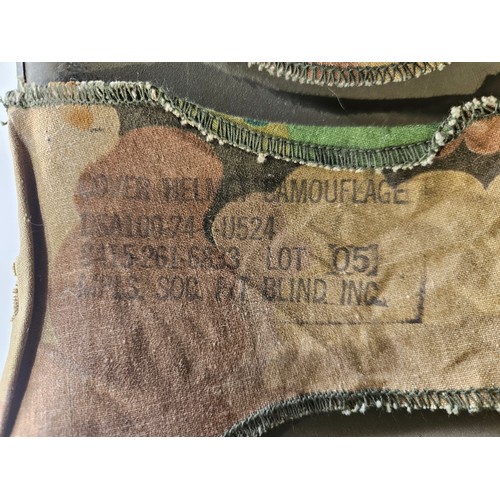 8102 - A US Vietnam War era helmet with liner and camouflage cover