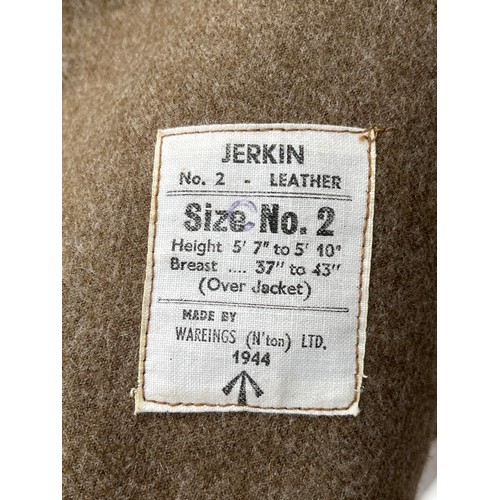 8152 - A WWII British leather jerkin, dated 1944, size no. 2