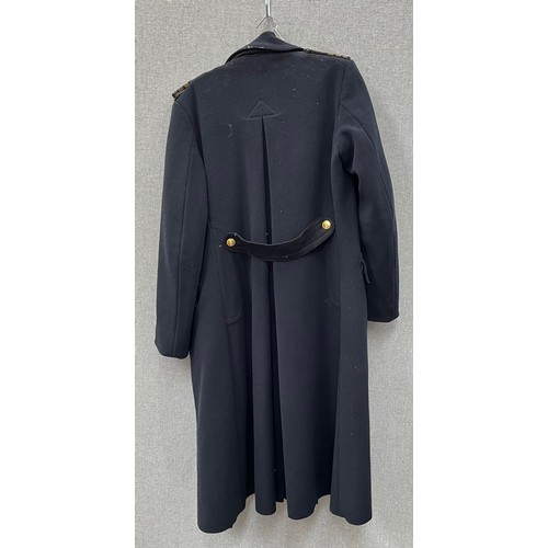 8155 - A WWII Royal Naval Great Coat dated 1940 to label, together with a battledress jacket (mothed) dated... 