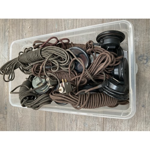 8360 - A large collection of WWII German earphones, some stamped with Waffen markings