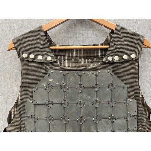 8150 - Scarce WWI Franco-British body armour, the khaki body supports externally fitted armoured sections t... 