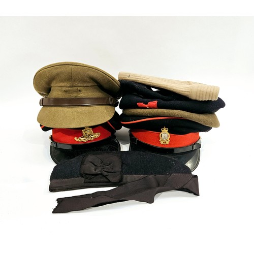 8111 - A box of military hats including officer's peaked dress hats, berets and side hats  (C)