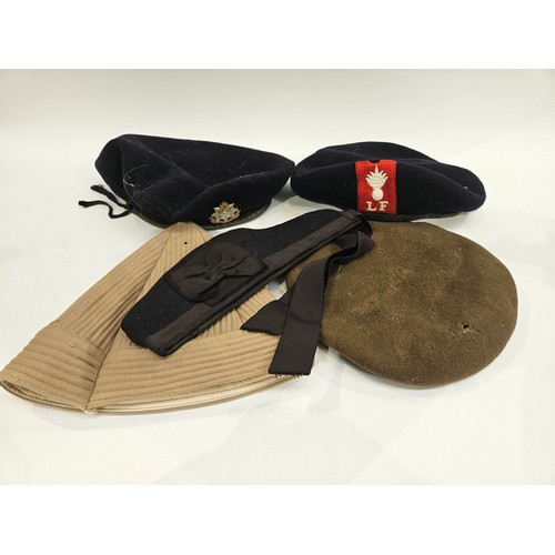 8111 - A box of military hats including officer's peaked dress hats, berets and side hats  (C)