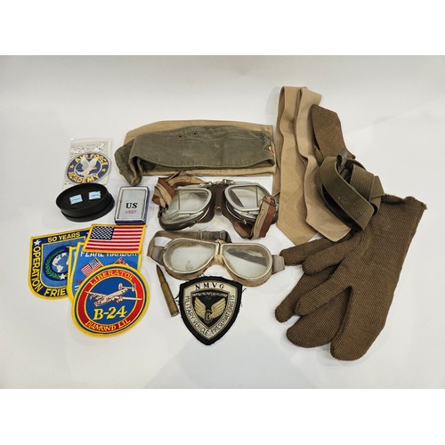 8114 - A box of miscellaneous militaria including goggles