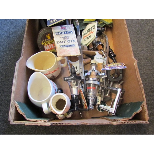 1168 - A box containing brewery items including Guinness bar pump, miniature bottles and handle, whisky jug... 