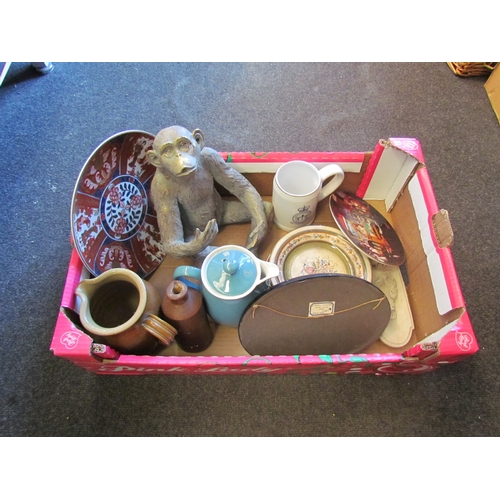 1169 - A box containing Denby coffee pot, Oriental plate, monkey figure, plates, RAF mug, two framed Concor... 