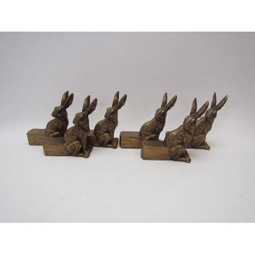 1212 - Six resin bronze hares as plant pot feet