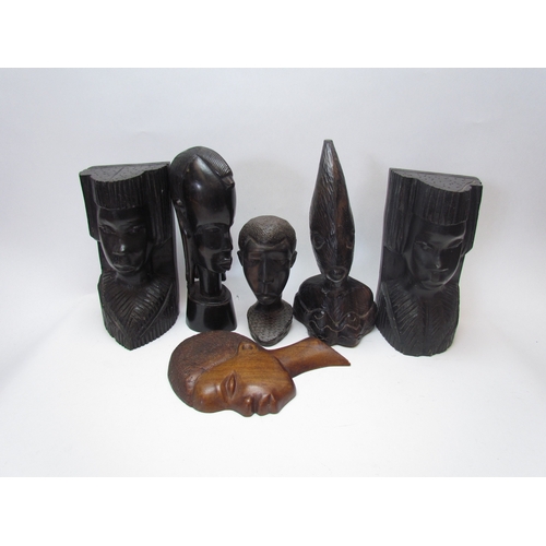 1218 - Six carved wooden African busts