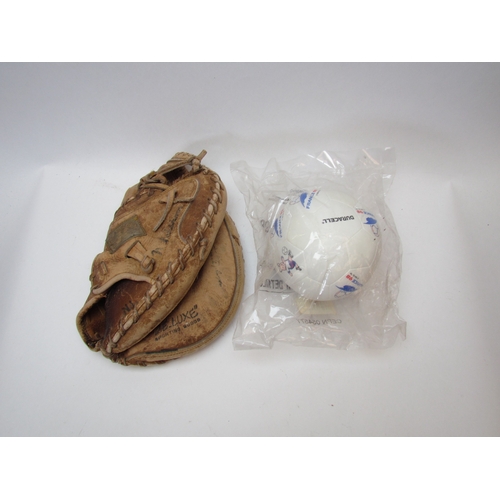 1228 - A vintage Western Alma Mater leather baseball glove together with a World Cup promotional miniball  ... 