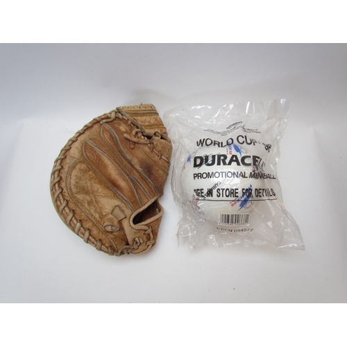 1228 - A vintage Western Alma Mater leather baseball glove together with a World Cup promotional miniball  ... 