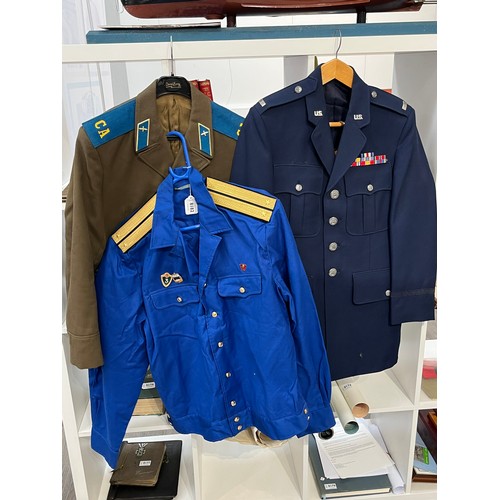 8182 - A quantity of various Russian USSR Soviet uniform including Air Force, together with a US jacket and... 