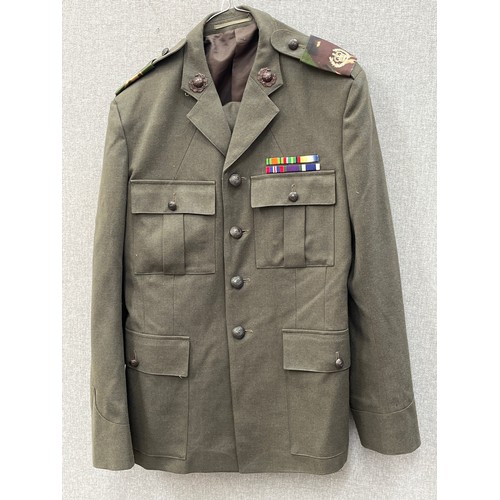 8186 - A post-war Royal Marines veteran's service dress jacket and trousers together with a 1950's / 60's L... 