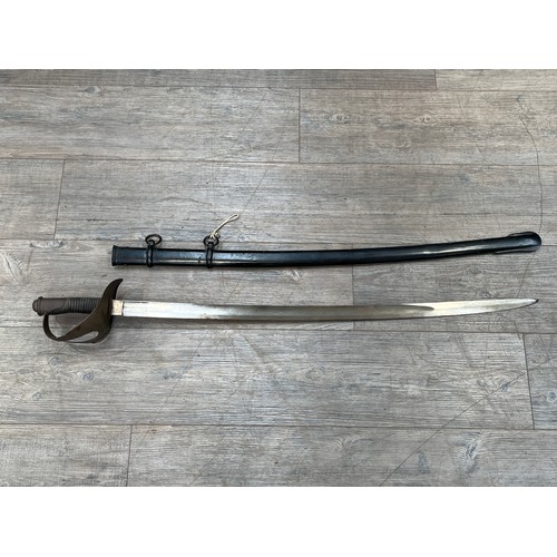 8405 - An Italian 1860 trooper’s sword, steel hilt with ribbed leather grip, joining a blade marked with BD... 