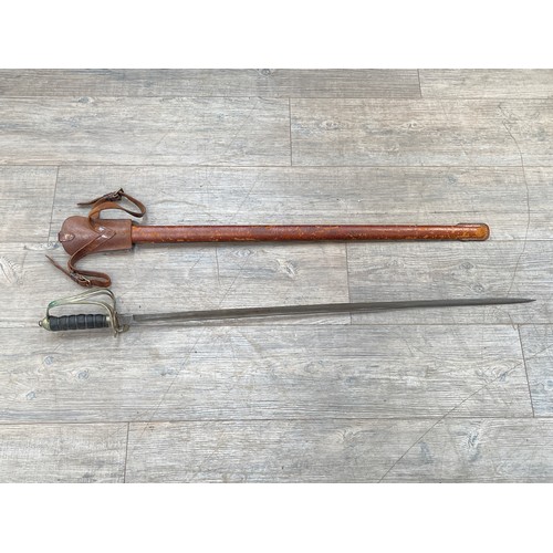 8389 - A George V 1821 pattern Royal Artillery officer's sword with leather field scabbard