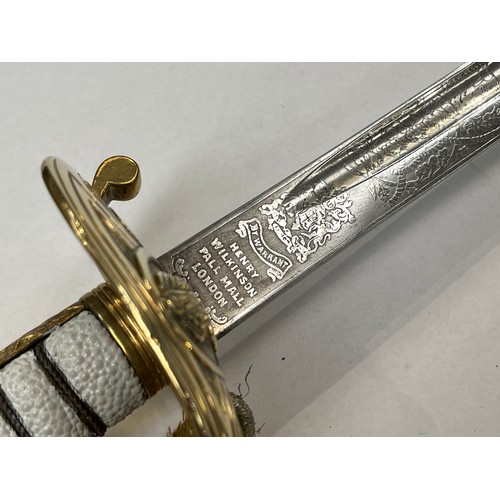 8390 - A Royal Naval officer's sword by Gieve Matthew’s / Wilkinson, painted textured grip, George crown to... 