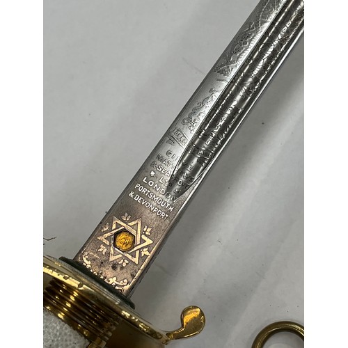 8390 - A Royal Naval officer's sword by Gieve Matthew’s / Wilkinson, painted textured grip, George crown to... 