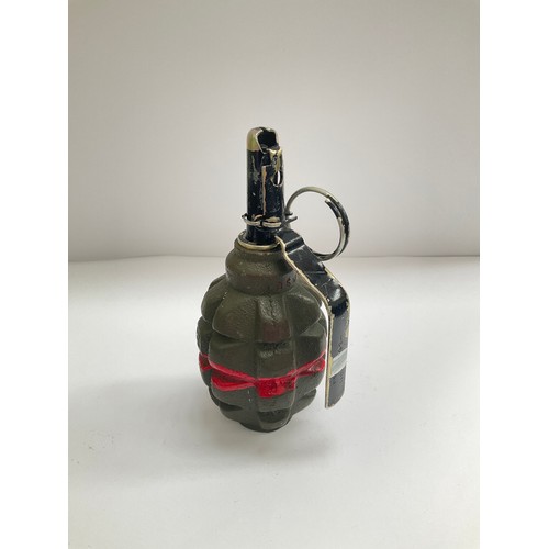 8559 - A Russian pineapple grenade, marked UZRGM. Deactivated