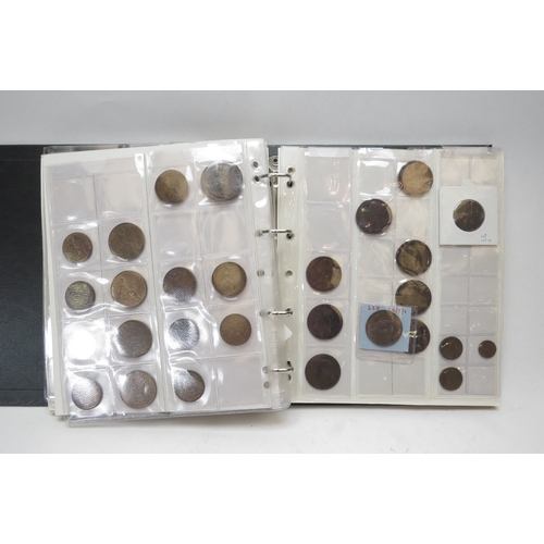 1250 - An album of copper & bronze British coins and tokens including 18th & 19th Century trade tokens from... 