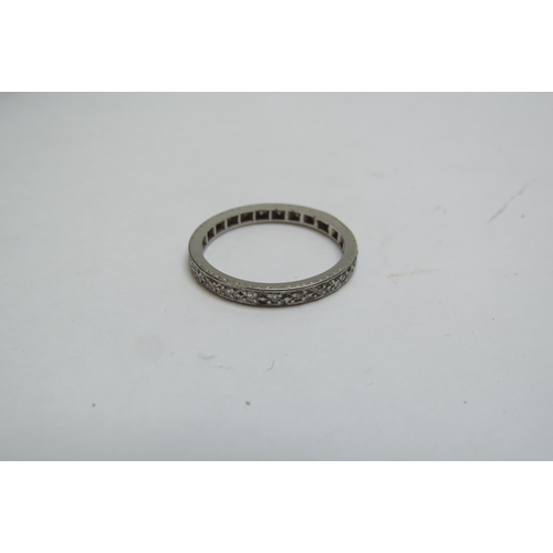 1252 - A diamond full eternity ring. Size Q, 2.8g  (C)