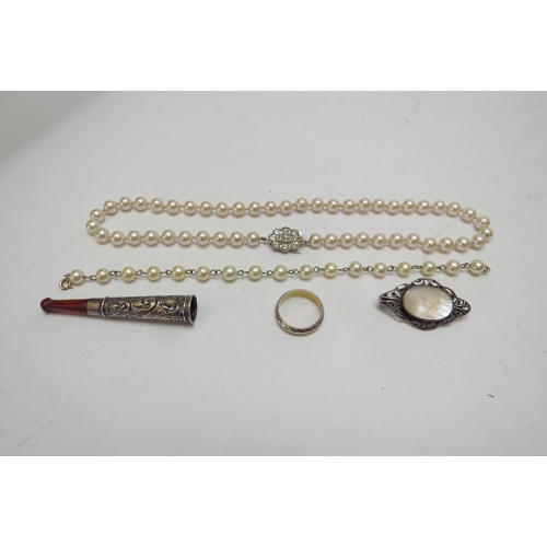 1257 - A silver cheroot holder, pearl bracelet, pearl necklace with silver clasp etc