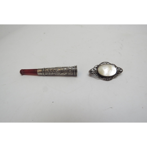 1257 - A silver cheroot holder, pearl bracelet, pearl necklace with silver clasp etc