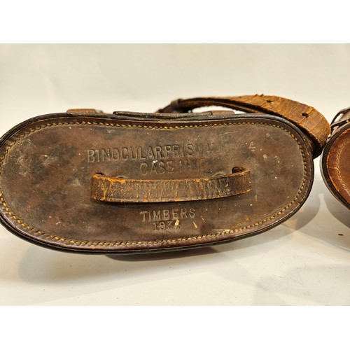 8248 - A pair of WWII RAF Air Ministry marked binoculars with brown leather case with another pair (2)  (C)