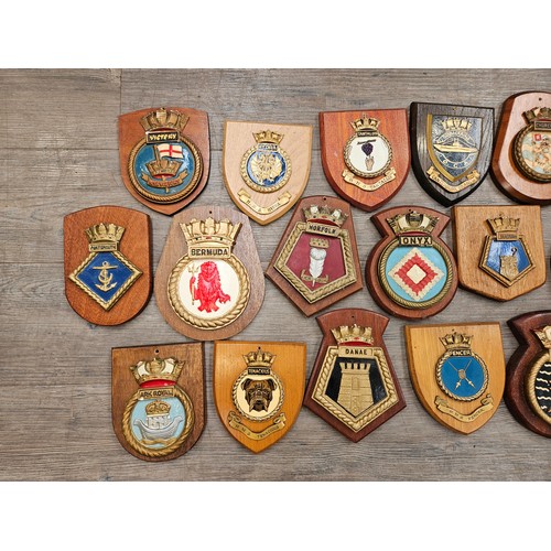 8255 - A collection of ship's crests including Beaver, Norfolk, Victory, Churchill, Seal, Onyx, Bermuda and... 