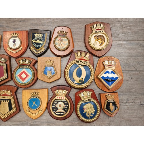 8255 - A collection of ship's crests including Beaver, Norfolk, Victory, Churchill, Seal, Onyx, Bermuda and... 