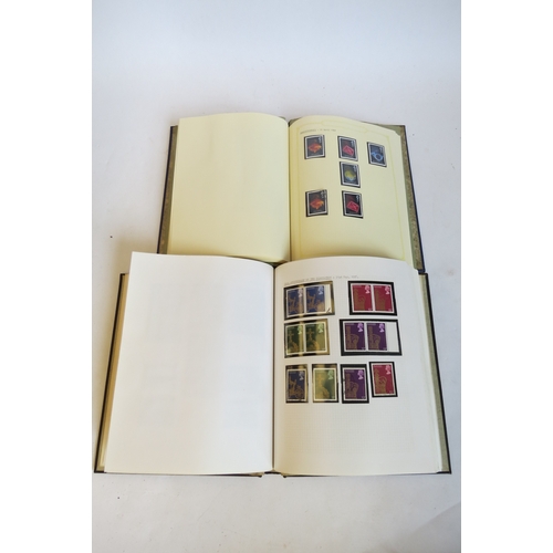 1379 - An album containing commemorative postage stamps issued during the Reign of Queen Elizabeth II and a... 