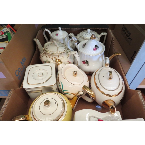 1387 - A box containing nine assorted teapots including Sadler