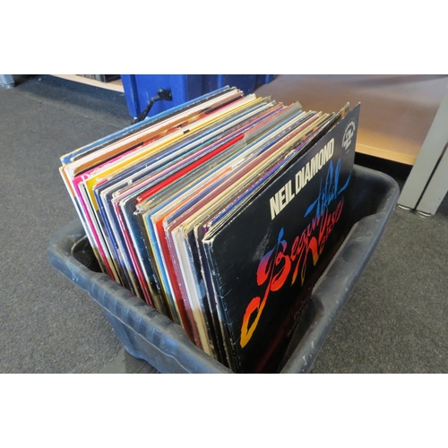 1399 - A collection of assorted vinyl LP records and 12