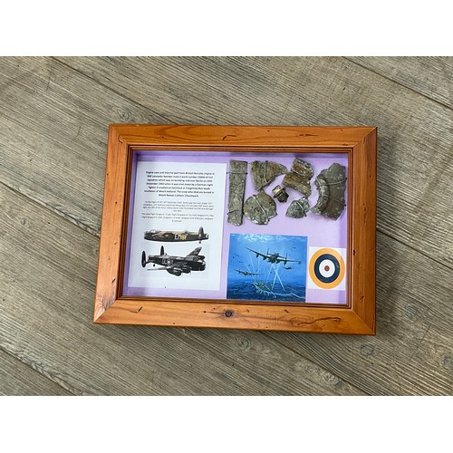 8568 - A collection of WWII Lancaster aircraft crash relics, D5836, displayed within a glazed frame with cr... 