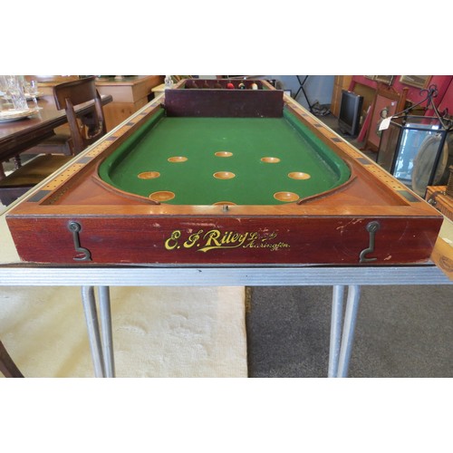 1096 - A folding table-top bagatelle table by E.J. Riley Ltd